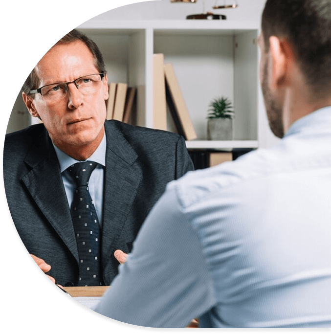 mature-lawyer-with-clients-meeting